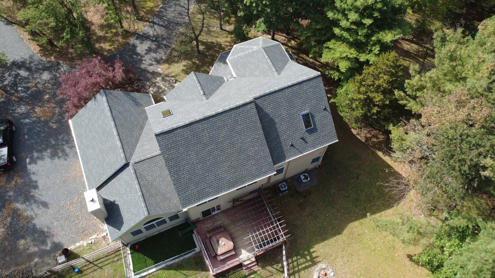 Photo 9 of 10, After: Finished roof at an angle from the back