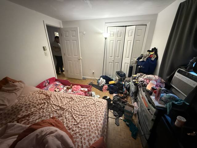 Before: same bedroom toward the closet and door