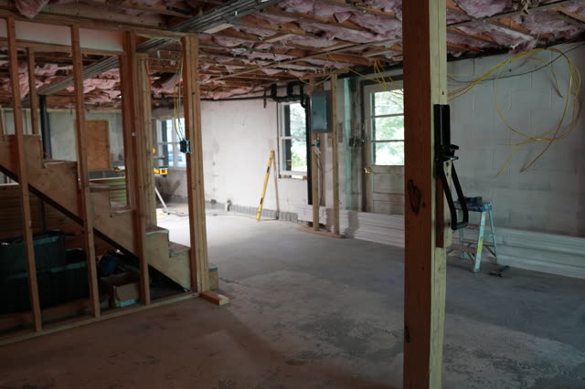 July 24: lower level framed, stairs on the left